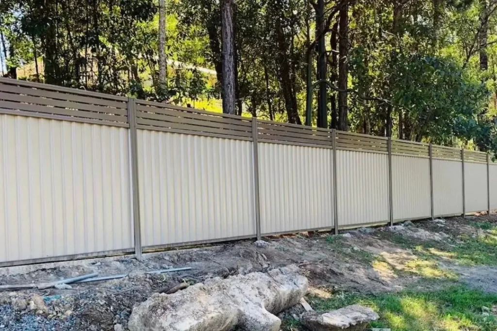 Colorbond fence with slatted toppers