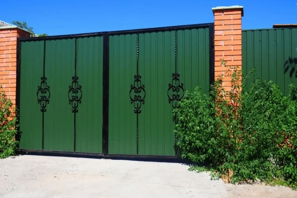 Metal fence and brick posts