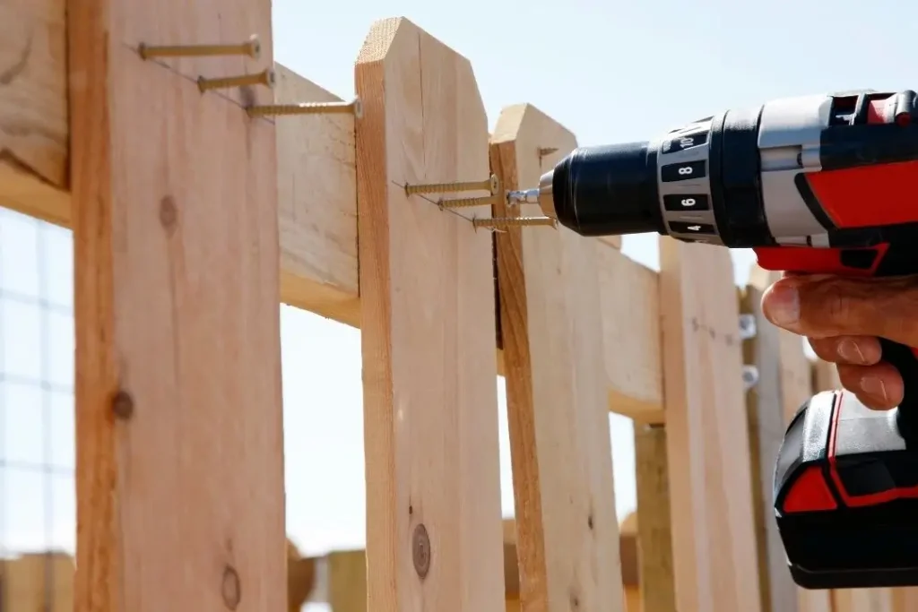 Timber fence being installed